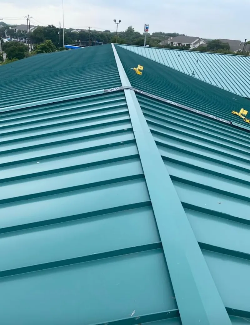 Green commercial metal roof ridge and valley for Metal Roof Repair in Cibolo
