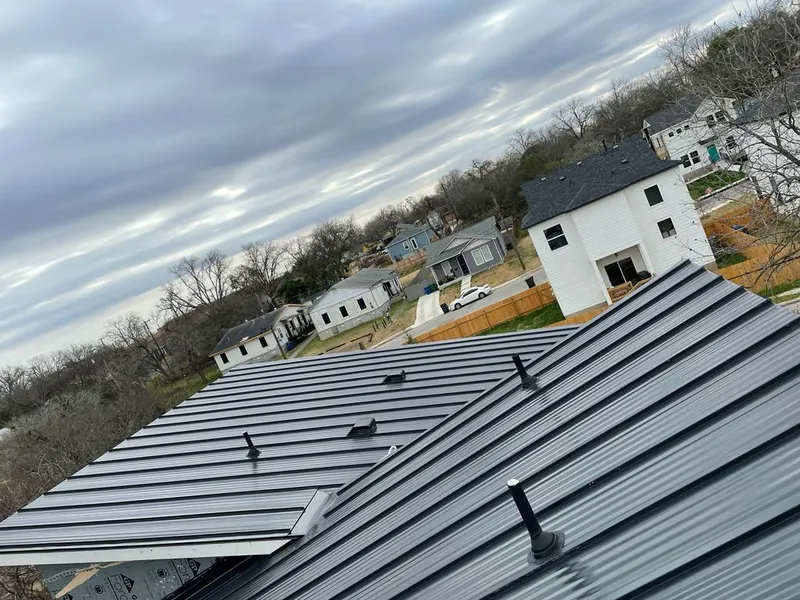 Standing seam metal roof panels with vents for Skylight Repair in Cibolo